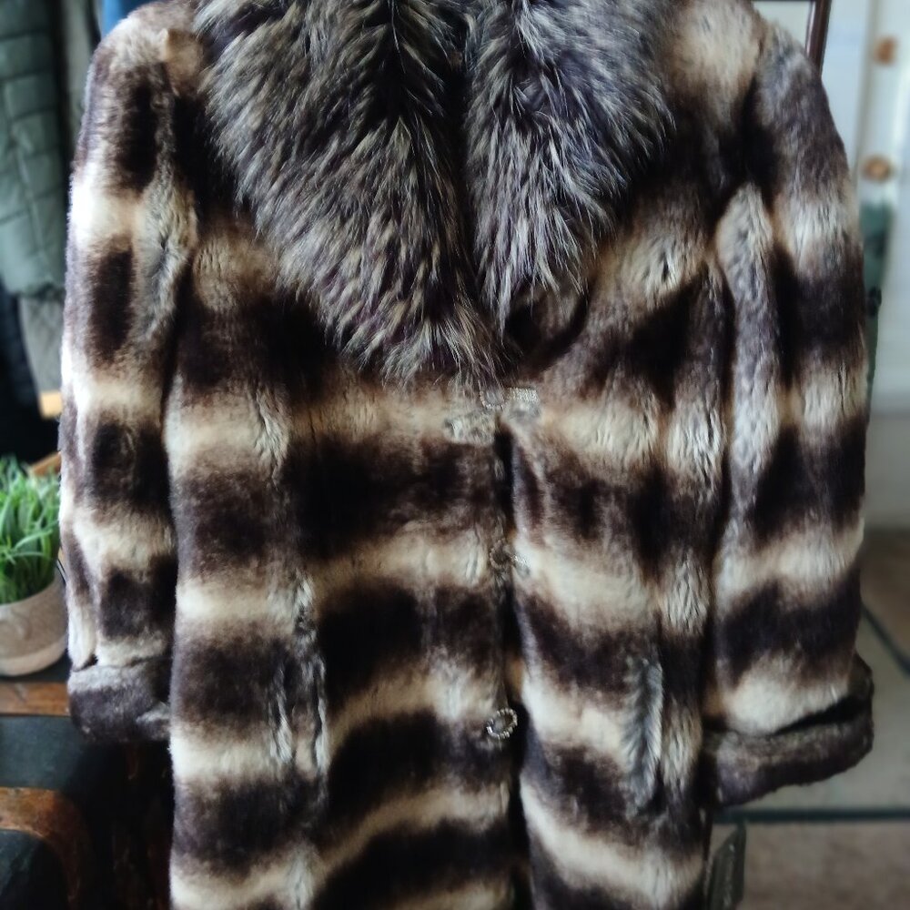 Pamela McCoy,  New with tags, Faux fur coat. Size L